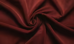 the texture of a plain red material is shown