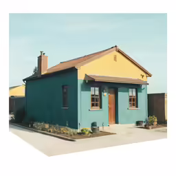 blue building with tiled roof and windows