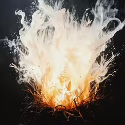 a close - up view of a match lit fire and smoke