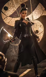the female costumed wonder is holding a sword