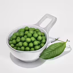 peas in a bowl with a leaf on the table