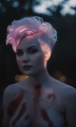a woman with pink hair standing outdoors with light