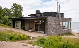 there is a very nice house near the water