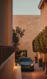 a car is parked on a side walk