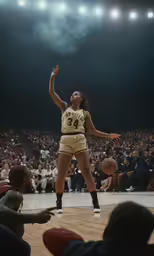 female basketball player about to dunk during an indoor game