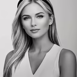 woman wearing a white shirt and a headband
