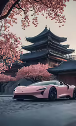 a car in front of a pagoda with cherry blossoms
