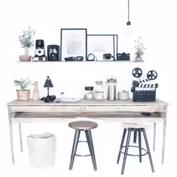 three black stools near a shelf with several pictures and other items on it