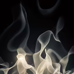 the background photo is black and the white smoke is blurry