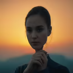 the face and shoulders of a woman in an artistic photo