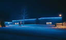 two people walking out onto the snow