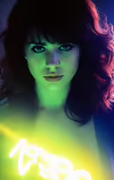 a woman is posing with a neon light