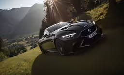 a black sports car on the road
