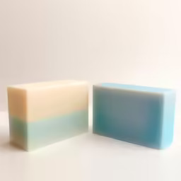 two soap bars one with one without
