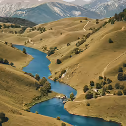 the valley is surrounded by mountains and rivers