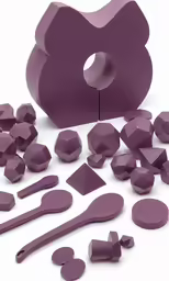 a variety of purple objects including forks, spoons and a knife