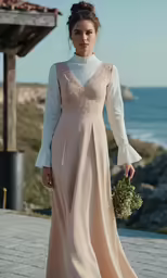 a young woman dressed in a light dress