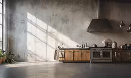 a room with a stove, oven and various utensils