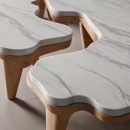 marble like seats sitting next to each other