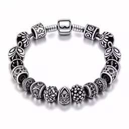 a beaded bracelet with silver beads and black and white designs,the silver color beads with flowers charm bracelet