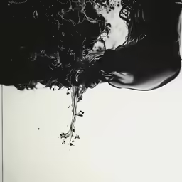 the top of someones hand in water