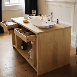 a bowl is sitting on top of a table in a room