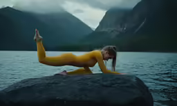 young lady posing in yellow and swimming suit
