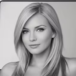 a black and white portrait of a blonde woman