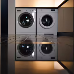 a white washer and dryer are seen in this photo