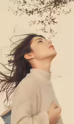 woman with her hair in the wind