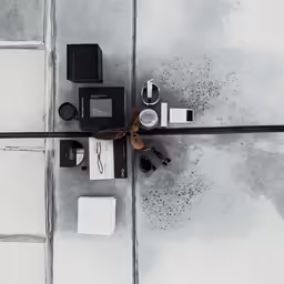 the contents of a perfume bottle and a pair of scissors