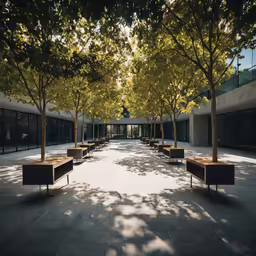a bunch of benches sitting on top of a cement ground