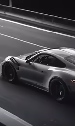 a car driving on a highway in the dark