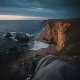 a photo taken from the top of a cliff at the beach