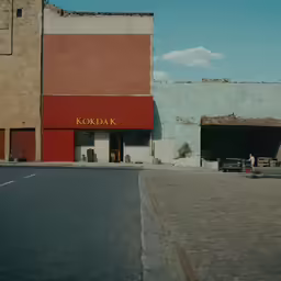 some old buildings and a truck that is parked outside