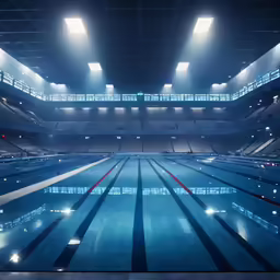 the inside of a large indoor swimming pool