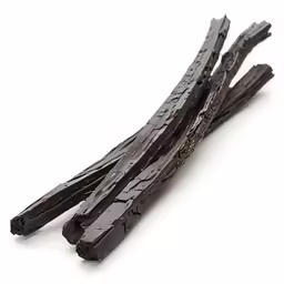 dark - stained wooden sticks of wood, against a white background