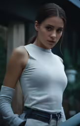 a woman in white top with an odd face