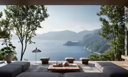 a living room filled with furniture and a view of the water