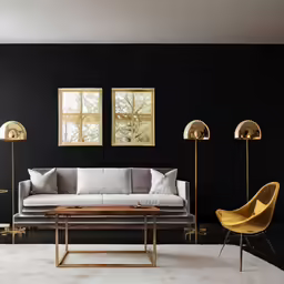 this black wall is a living room with gold accents and modern furniture
