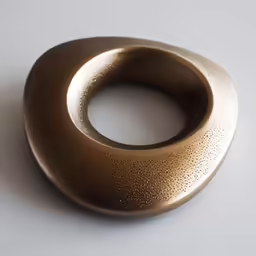 an odd looking object on the ground in a room