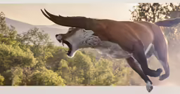 a large long horn dog jumping into the air