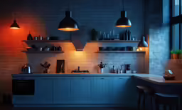 an elegantly decorated home bar is lit up in the dark