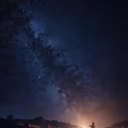 a large long road under the night sky