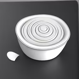 a white bowl on a black background with spoon