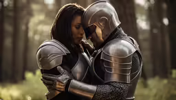 man in armor hugging woman with forest in background