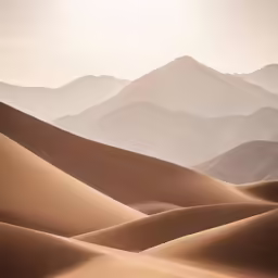 an arid desert with mountains in the distance