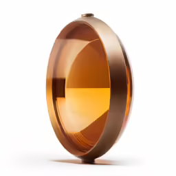 a close up of a glass object with gold foil