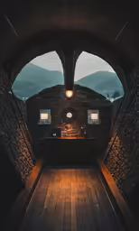 an old building in the mountains at night