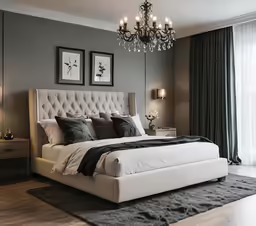 a bedroom that has a large bed on a hard wood floor